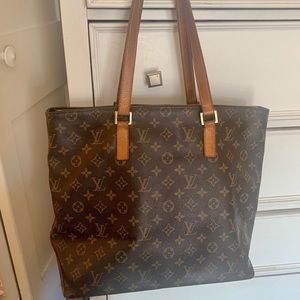 Large zipper monogram tote with broken strap